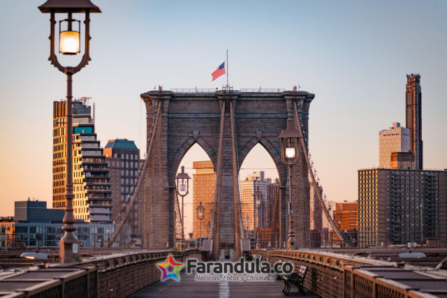 Woman tourist watching Brooklyn Bridge, New York City, USA